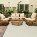 Modern outdoor rattan furniture set on a stylish terrace in Manila, Philippines.