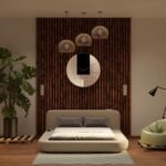 a bedroom with a large bed and a round mirror on the wall